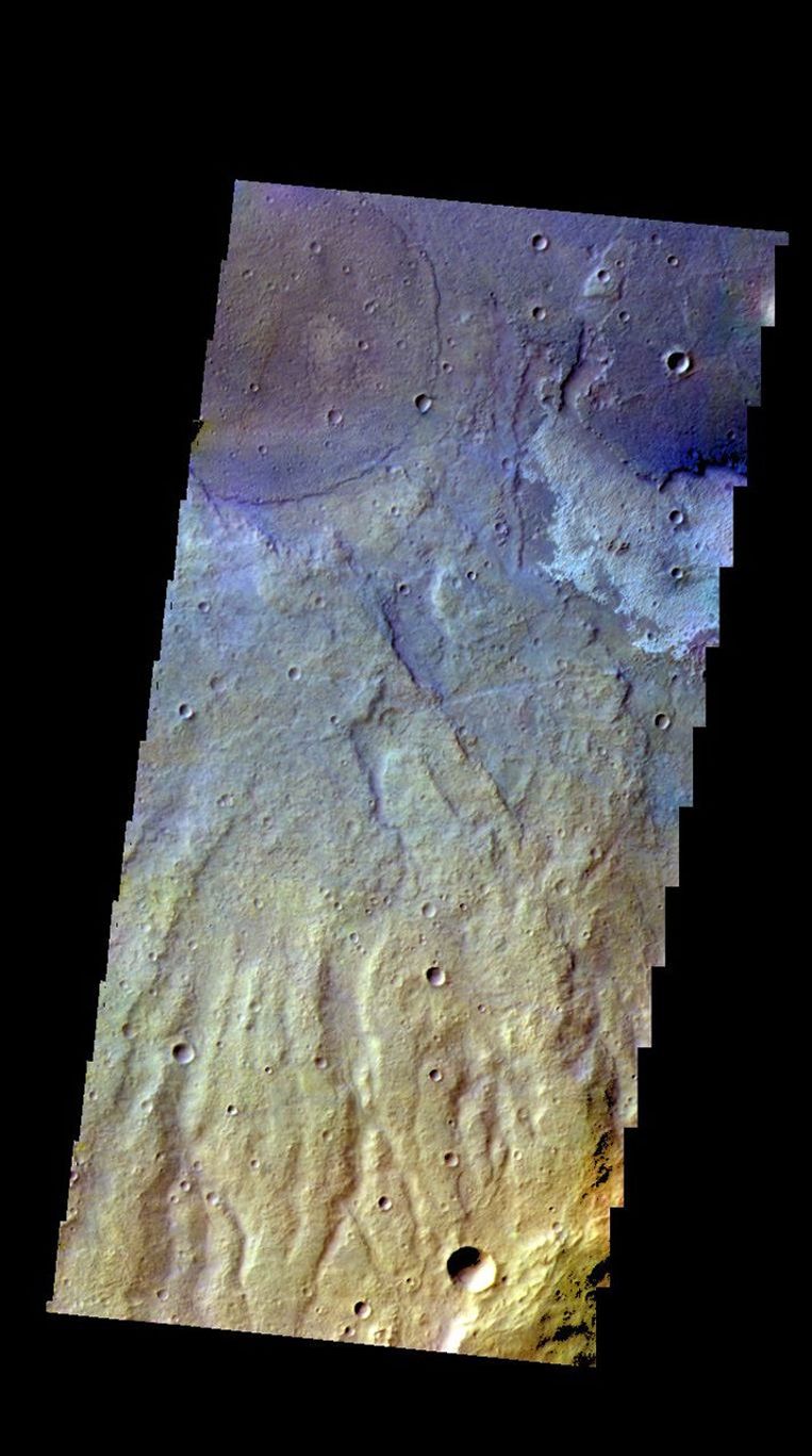 The THEMIS camera contains 5 filters. The data from different filters can be combined in multiple ways to create a false color image. This image from NASA's 2001 Mars Odyssey spacecraft shows part of the plains of Terra Sirenum.