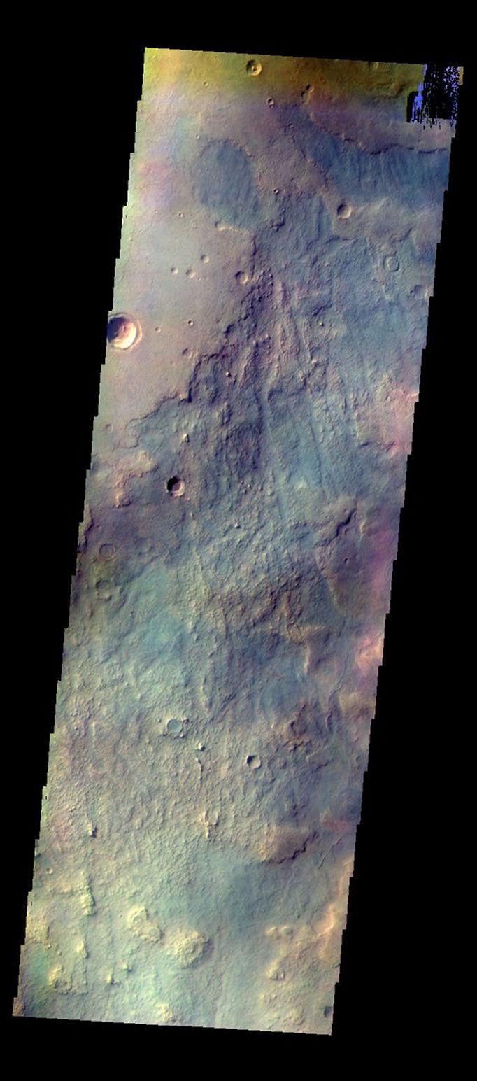 The THEMIS camera contains 5 filters. Data from different filters can be combined in many ways to create a false color image. This image from NASA's 2001 Mars Odyssey spacecraft shows multiple textures of the plains located northwest of the Argyre basin.