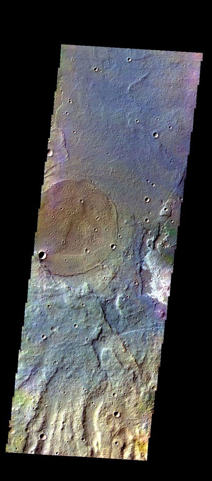 The THEMIS camera contains 5 filters. The data from different filters can be combined in multiple ways to create a false color image. This image from NASA's 2001 Mars Odyssey spacecraft shows part of the plains of Terra Sirenum.
