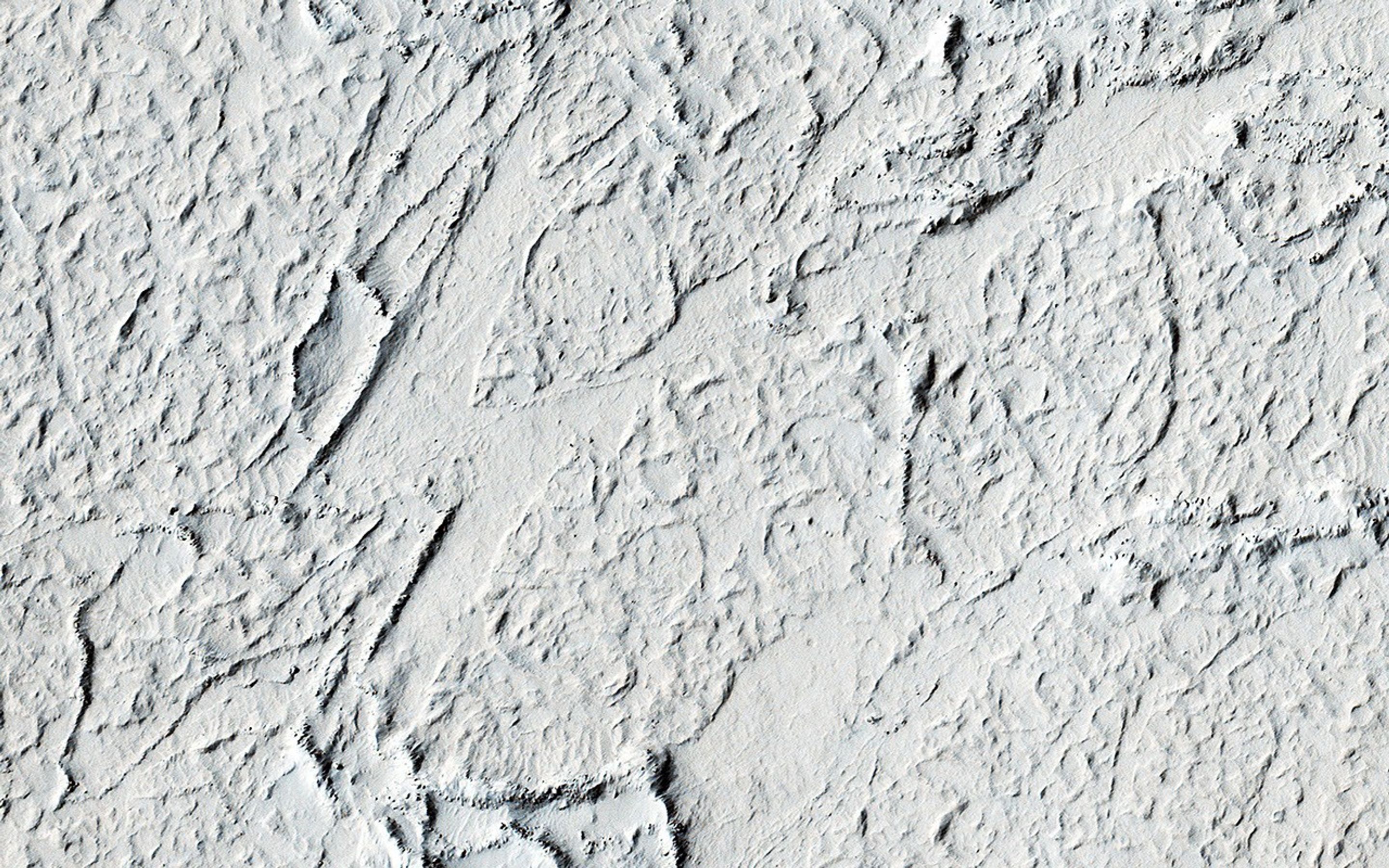 Almost all of vast Mars' Amazonis Planitia is covered by lava flows, an area comparable to that of the entire continental United States, as seen by NASA's Mars Reconnaissance Orbiter spacecraft.