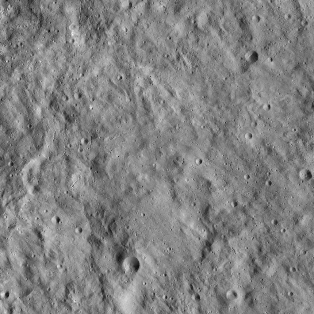 This image from NASA's Dawn spacecraft shows a portion of Ceres known as Erntedank Planum, a broad plateau 345 miles (555 kilometers) wide. The terrain seen here lies just to the southeast of Occator Crater, home of Ceres' brightest region.