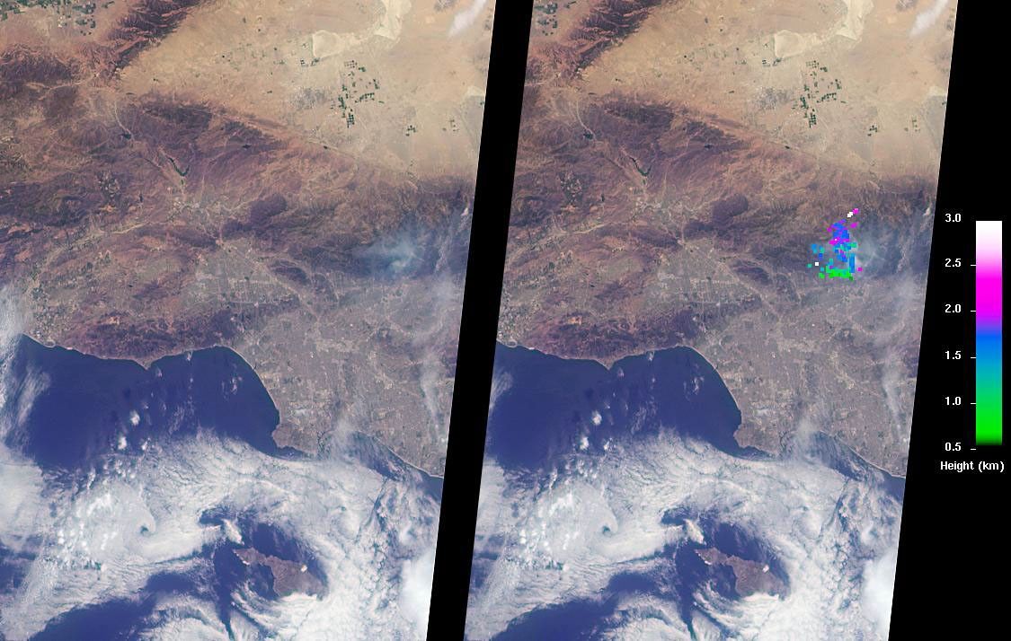 NASA's Terra satellite captured this view of the San Gabriel Mountains and Los Angeles Basin where have burned more than 4,900 acres since June 20, sending up plumes of smoke visible to many in the Los Angeles basin.