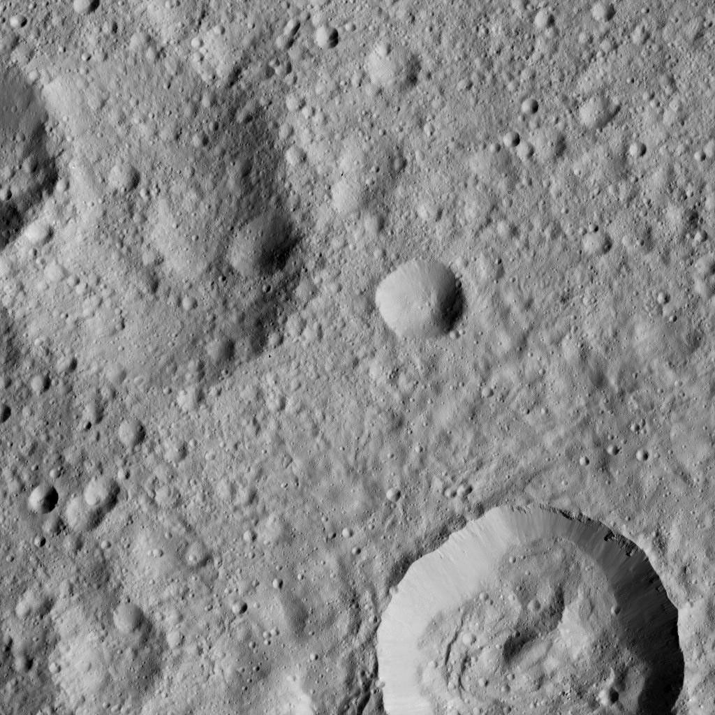 This view from NASA's Dawn spacecraft shows cratered terrain on Ceres, centered at 10 degrees south latitude, 197 degrees east longitude.