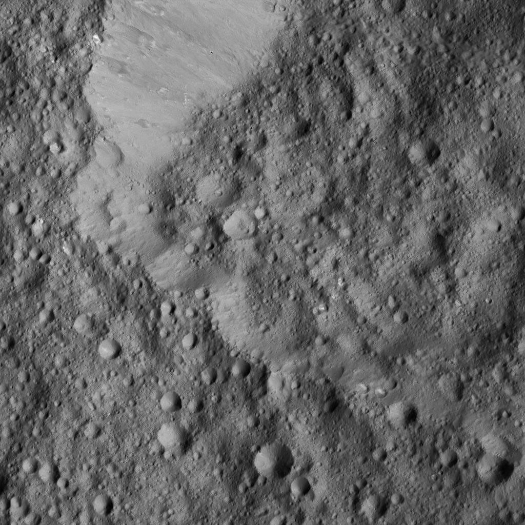 This view from NASA's Dawn spacecraft, captured on June 1, 2016, shows Rongo Crater, located near Ceres' equator.