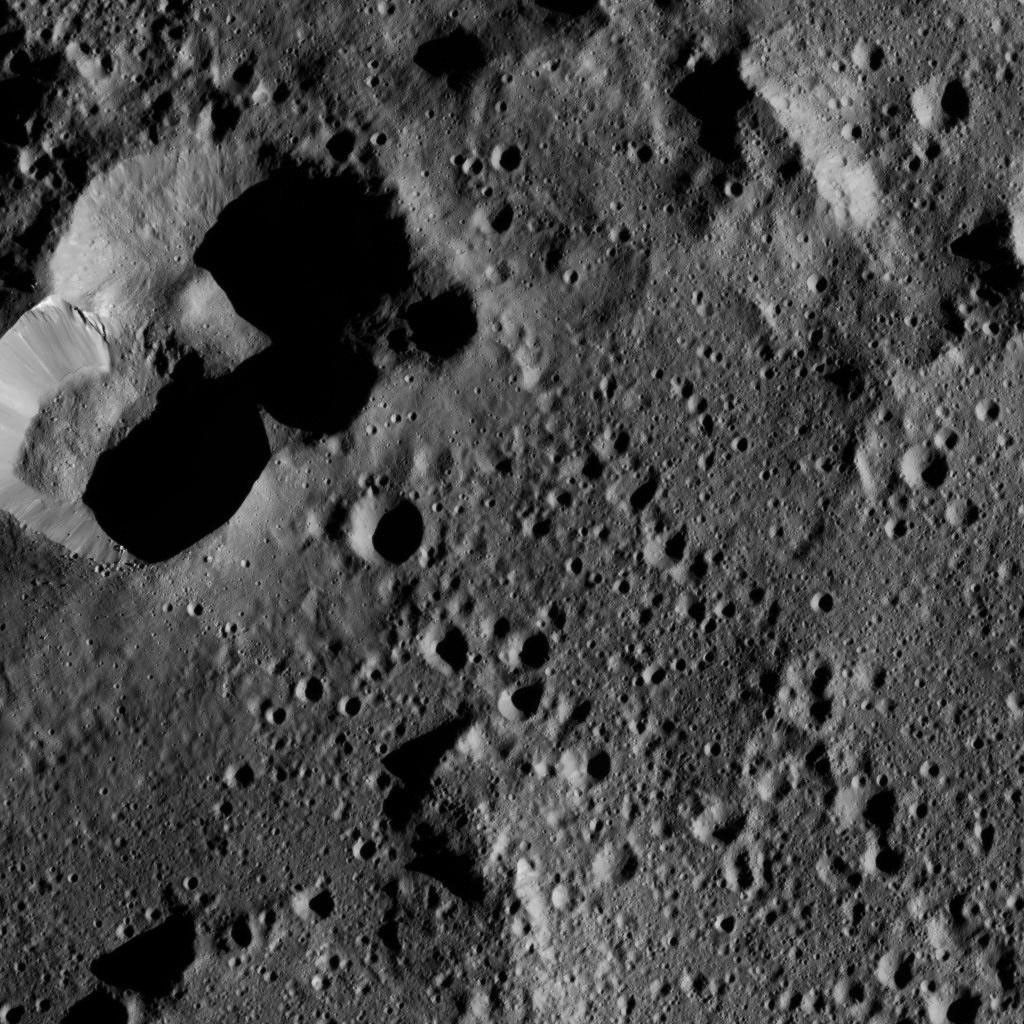 This view from NASA's Dawn spacecraft shows cratered terrain on the edge of the giant crater Yalode. This image was taken on June 1, 2016.