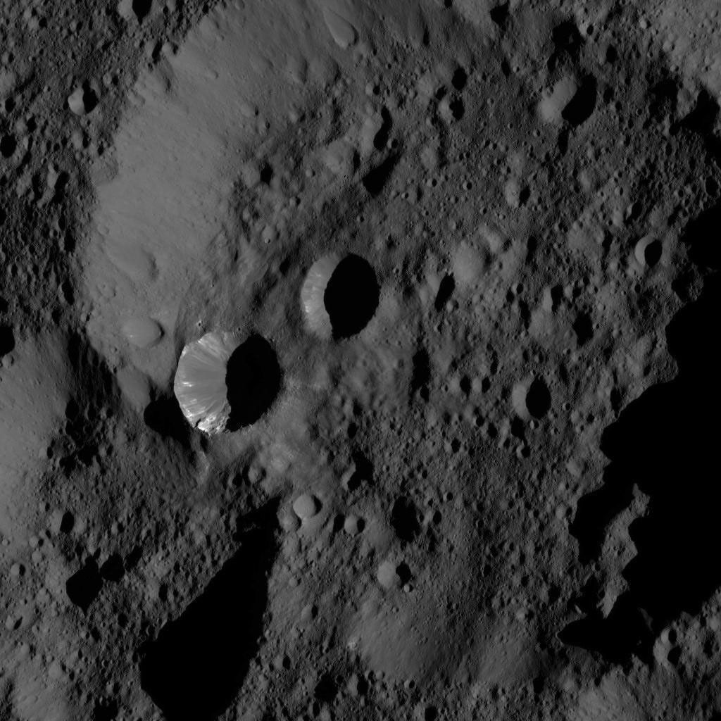 NASA's Dawn took this image on June 3, 2016, from its low-altitude mapping orbit, at a distance of about 240 miles (385 kilometers) above the surface. This view shows terrain located at approximately 60 degrees north latitude on Ceres.