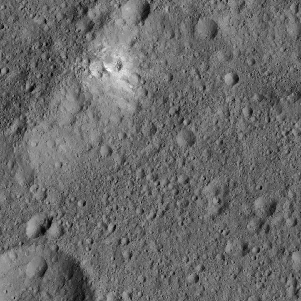 This image from NASA's Dawn spacecraft, taken on June 6, 2016, features bright material (at upper left) along the rim of the giant crater named Kerwan (174 miles, 280 kilometers wide) on Ceres.