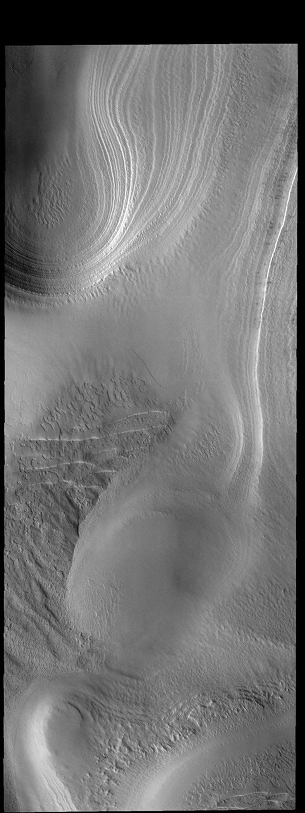 This image captured by NASA's 2001 Mars Odyssey spacecraft shows some of the multiple layers of ice that make up the South Polar cap.