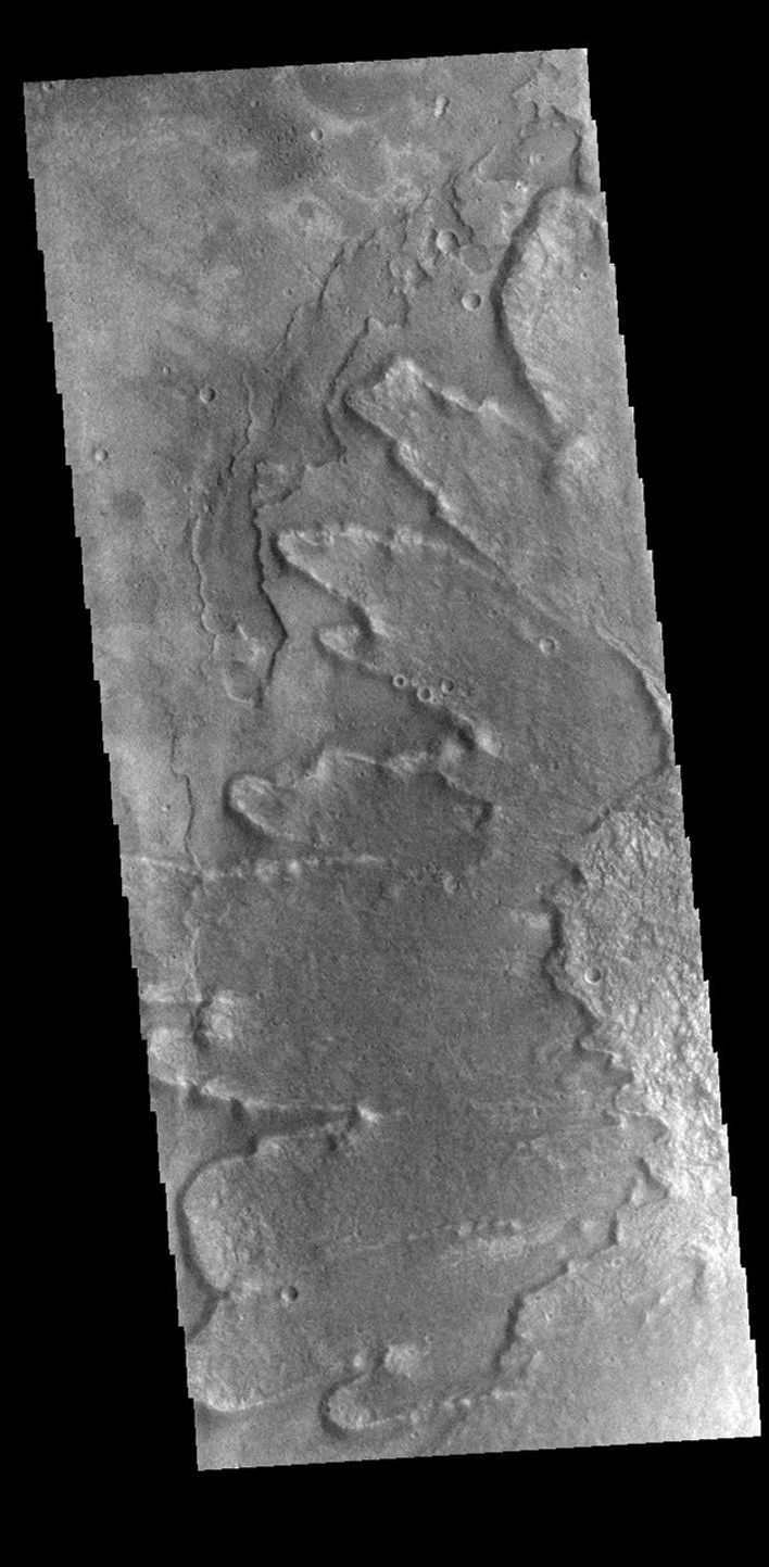 This image captured by NASA's 2001 Mars Odyssey spacecraft shows part of the ejecta around Yuty Crater.