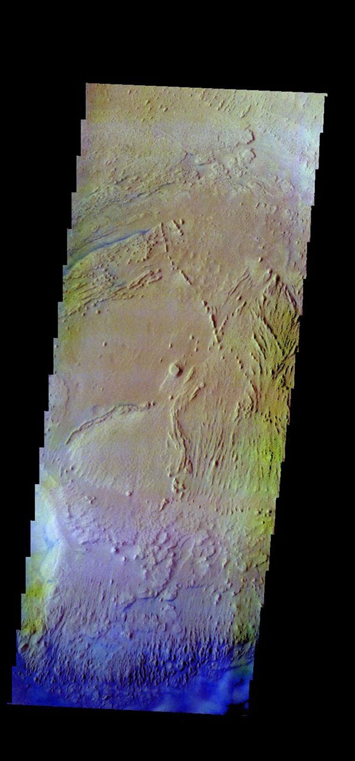 The THEMIS camera contains 5 filters. The data from different filters can be combined in multiple ways to create a false color image. This image from NASA's 2001 Mars Odyssey spacecraft shows part of the interior deposit in Firsoff Crater.