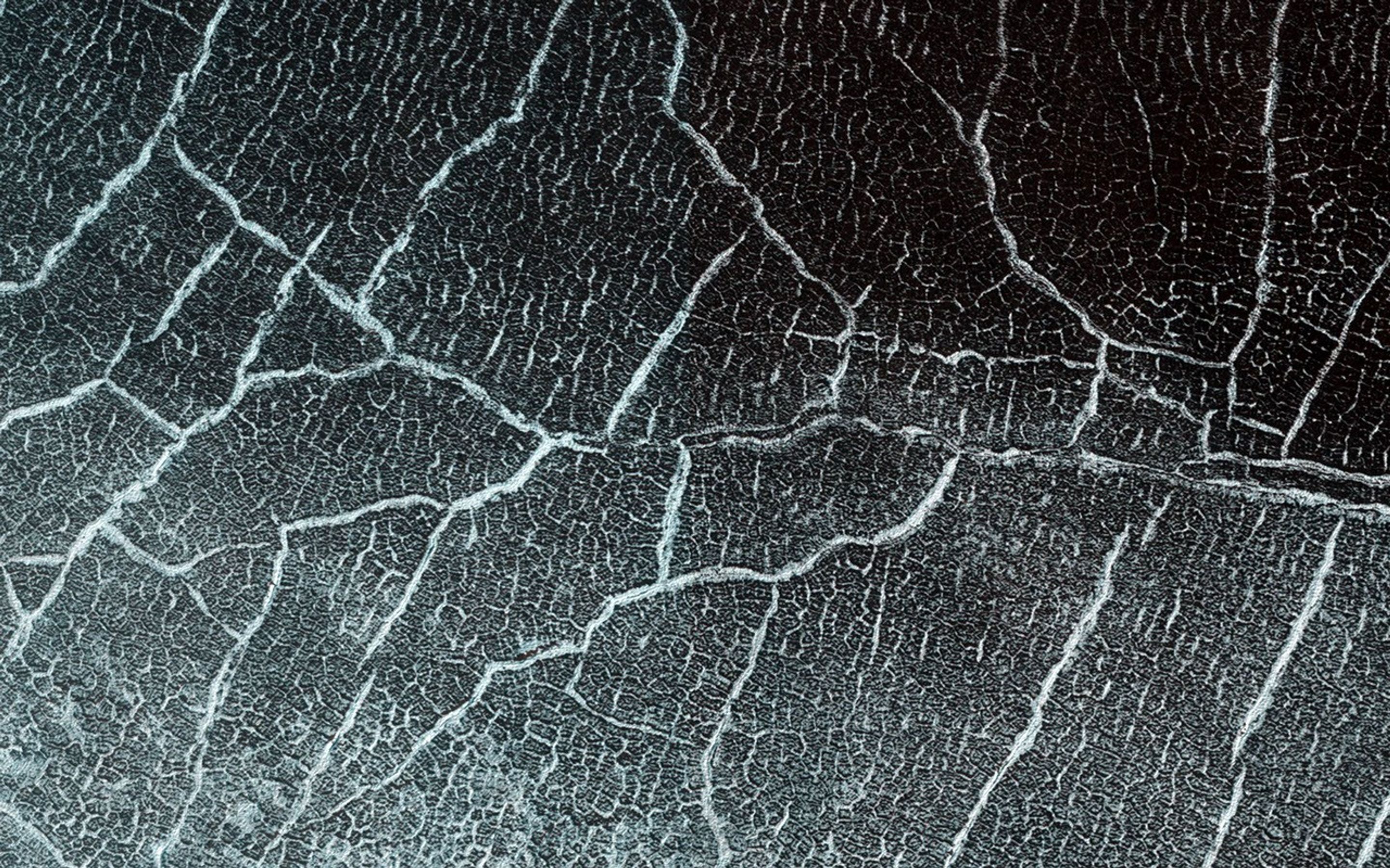 Subtle variations in color look like brush strokes as the lightly frosted terrain reflects light on Mars as seen by NASA's Mars Reconnaissance Orbiter.
