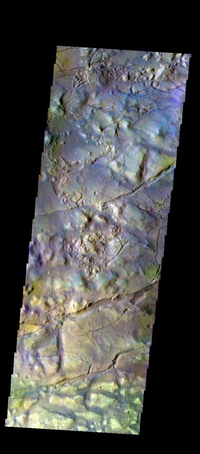 The THEMIS camera contains 5 filters. The data from different filters can be combined in multiple ways to create a false color image. This image from NASA's 2001 Mars Odyssey spacecraft shows part of Gorgonum Chaos.