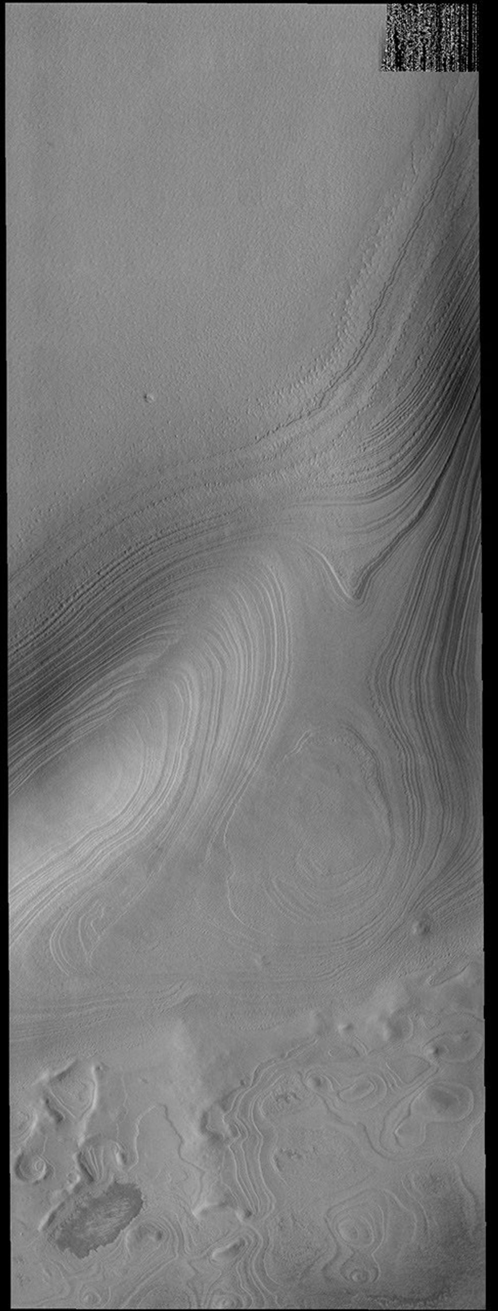 This image captured by NASA's 2001 Mars Odyssey spacecraft shows the layering of the South Polar cap of Mars.