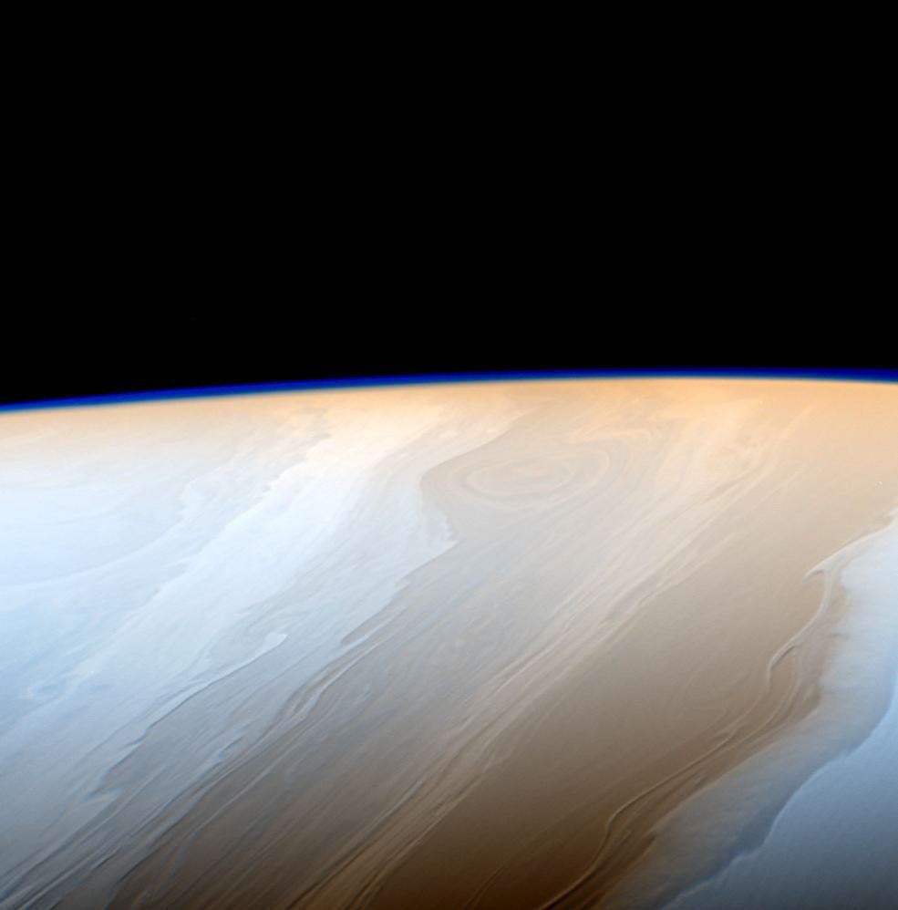 Clouds on Saturn take on the appearance of strokes from a cosmic brush thanks to the wavy way that fluids interact in Saturn's atmosphere in this false color view from NASA's Cassini spacecraft.