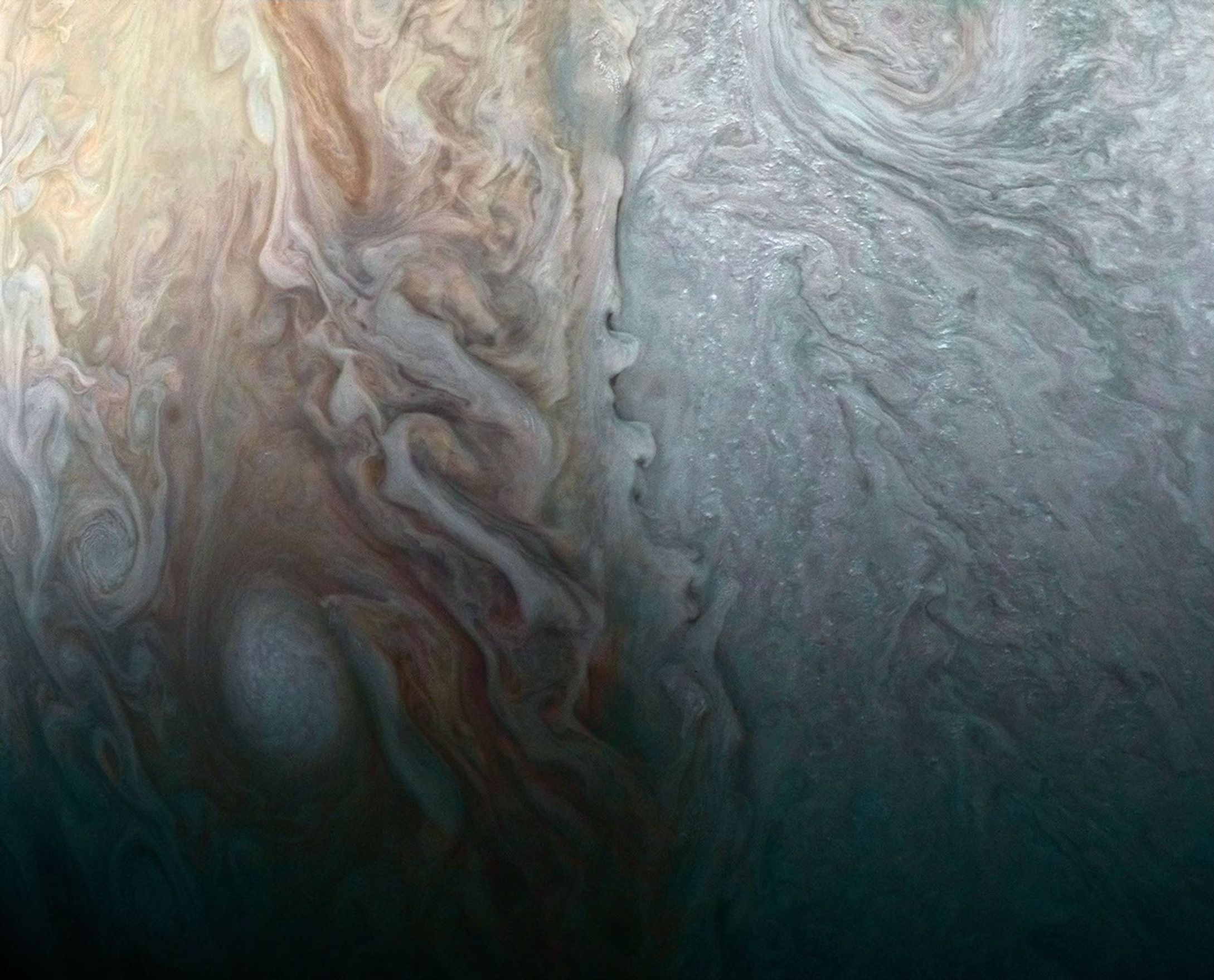 This image, taken by the JunoCam imager on NASA's Juno spacecraft, highlights a feature on Jupiter where multiple atmospheric conditions appear to collide.