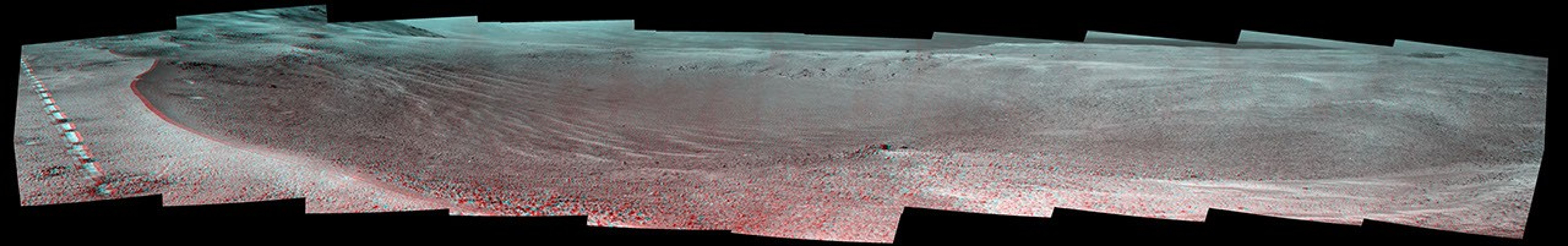 This stereo view of a small, relatively fresh crater on Mars combines images from NASA's Opportunity Mars rover. The rover paused beside the crater in April 2017, during the 45th anniversary of the Apollo 16 mission to the moon.