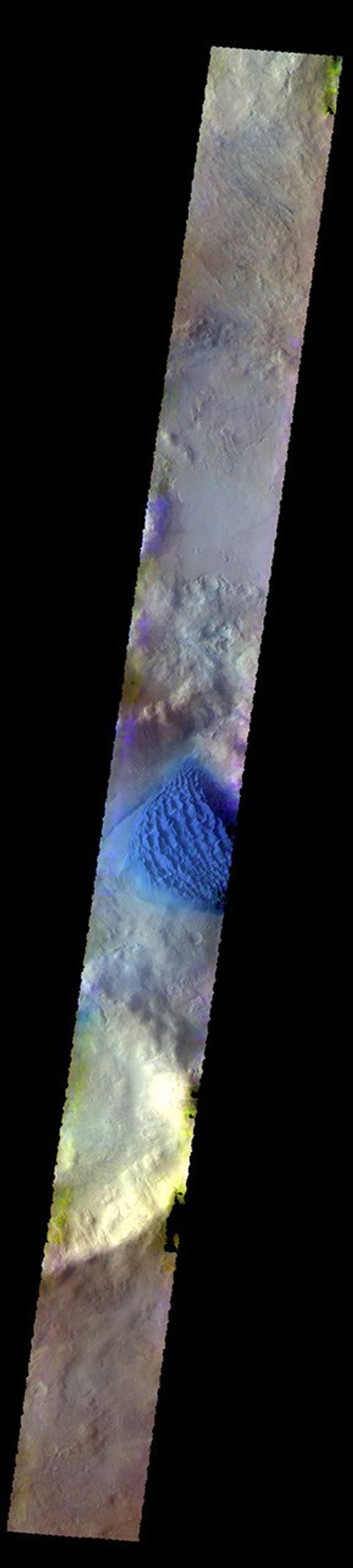The THEMIS camera contains 5 filters. The data from different filters can be combined in multiple ways to create a false color image. This image from NASA's 2001 Mars Odyssey spacecraft shows the dune field on the floor of Matara Crater in Noachis Terra.