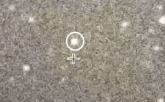 This frame from an animation shows a Kuiper Belt object know as 2014 MU69, as seen by NASA's New Horizons.