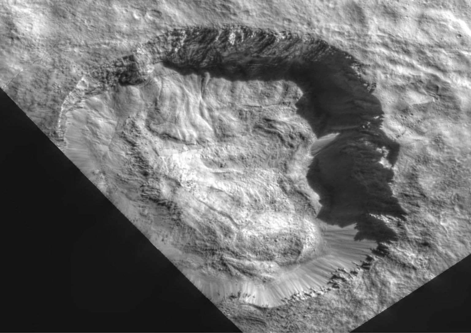 This view from NASA's Dawn mission shows the floor of Ceres' Juling Crater. The crater floor shows evidence of the flow of ice and rock, similar to rock glaciers in Earth's polar regions.