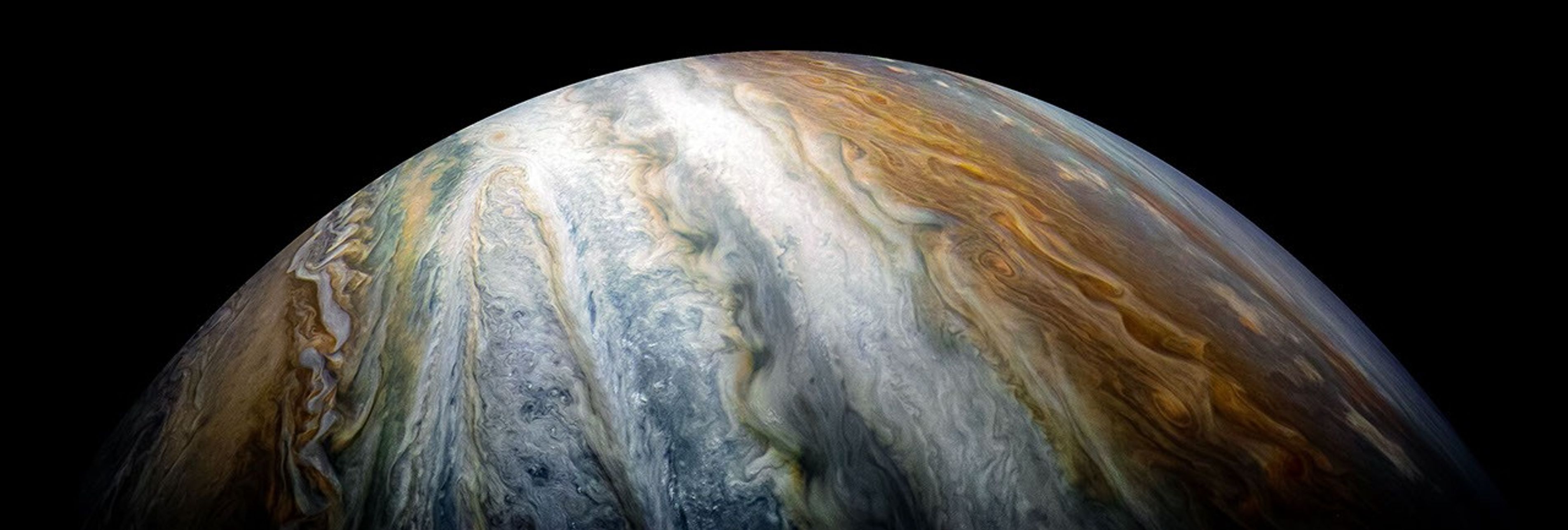 Colorful swirling cloud belts dominate Jupiter's southern hemisphere in this image captured by NASA's Juno spacecraft on Dec 16, 2017.