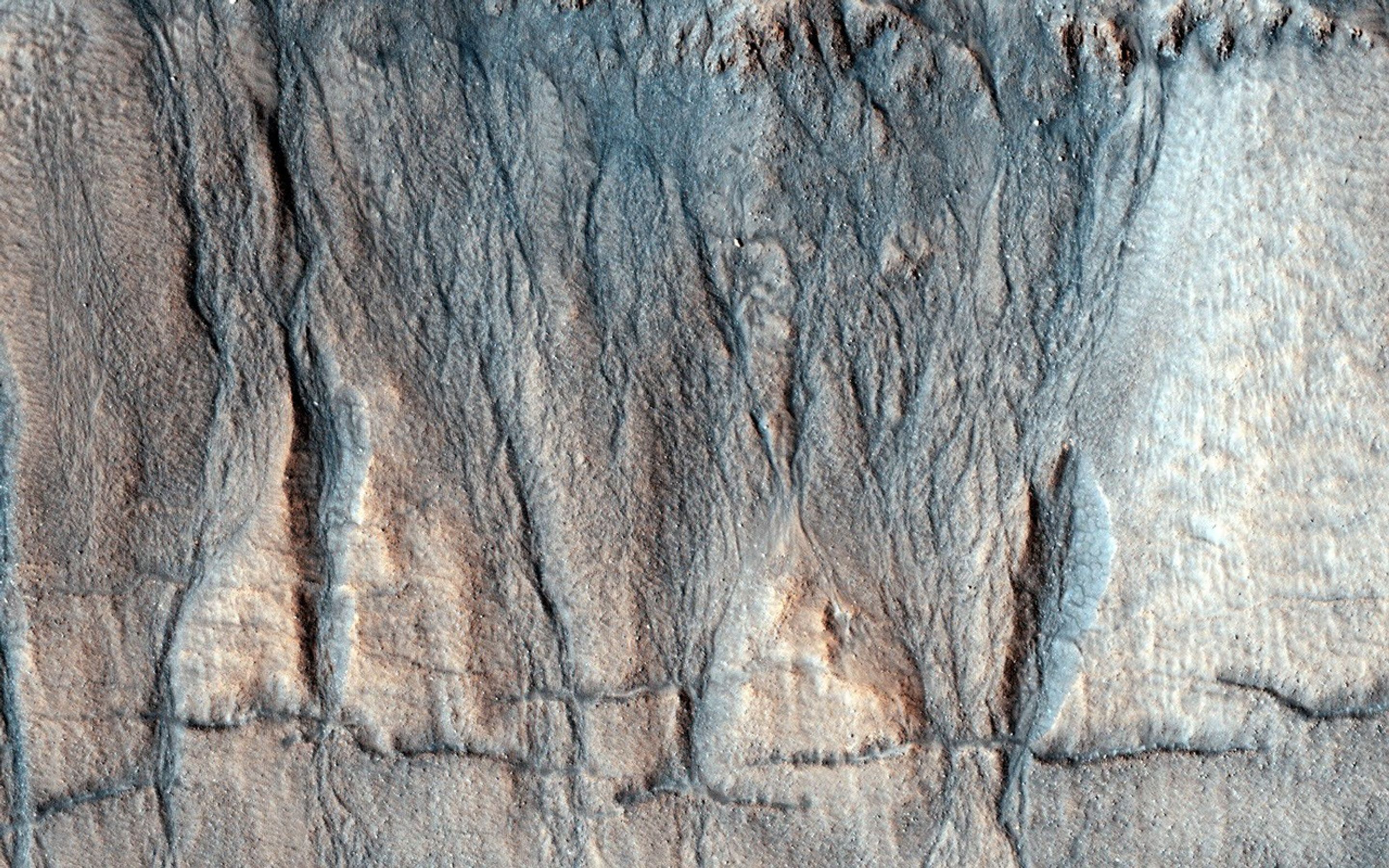 
			The Evolution of Gully Features in Acidalia Planitia - NASA Science			