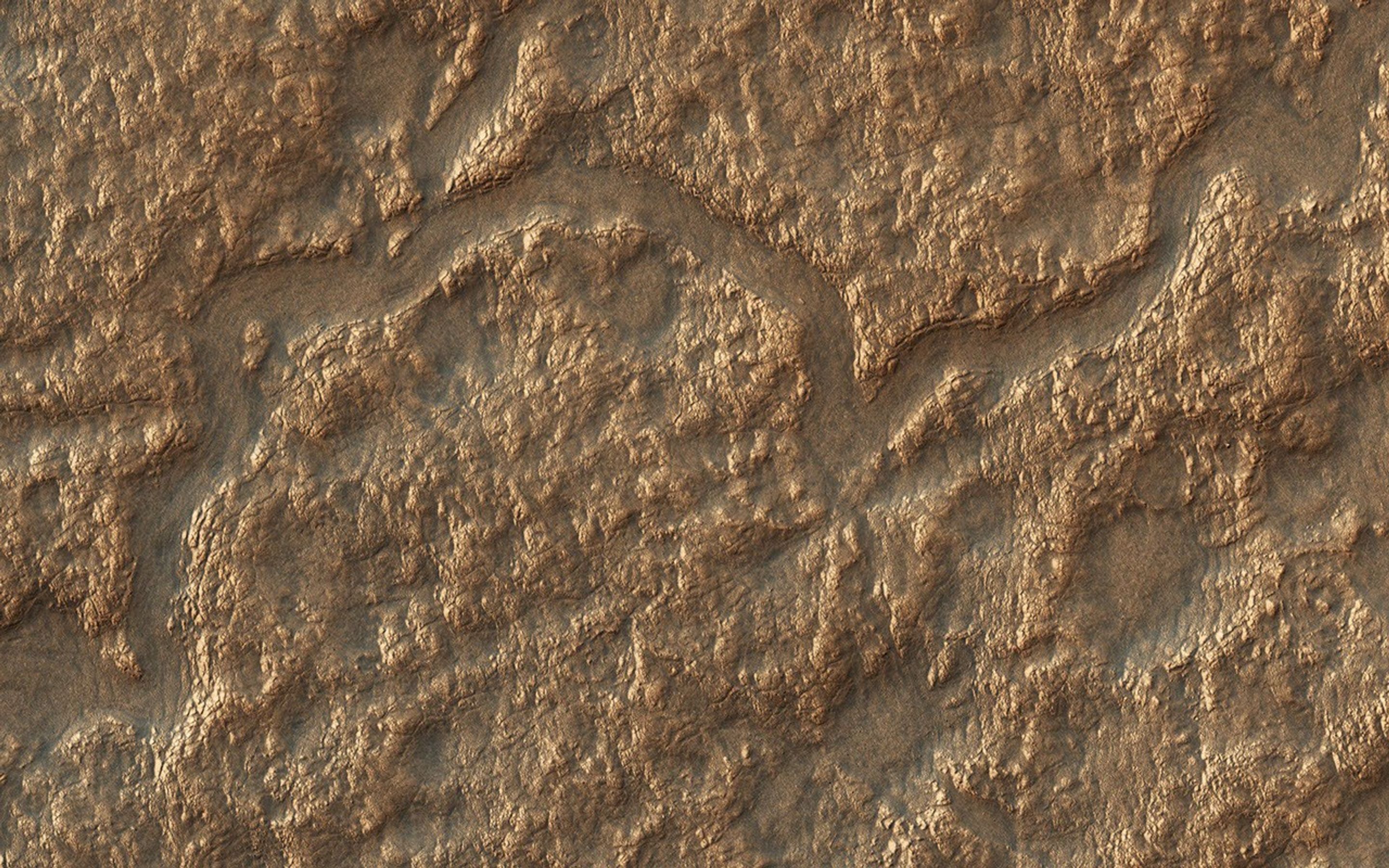 Lyot Crater is located in the Northern lowlands of Mars. The crater's floor marks the lowest elevation in the Northern Hemisphere as seen in this image from NASA's Mars Reconnaissance Orbiter (MRO.