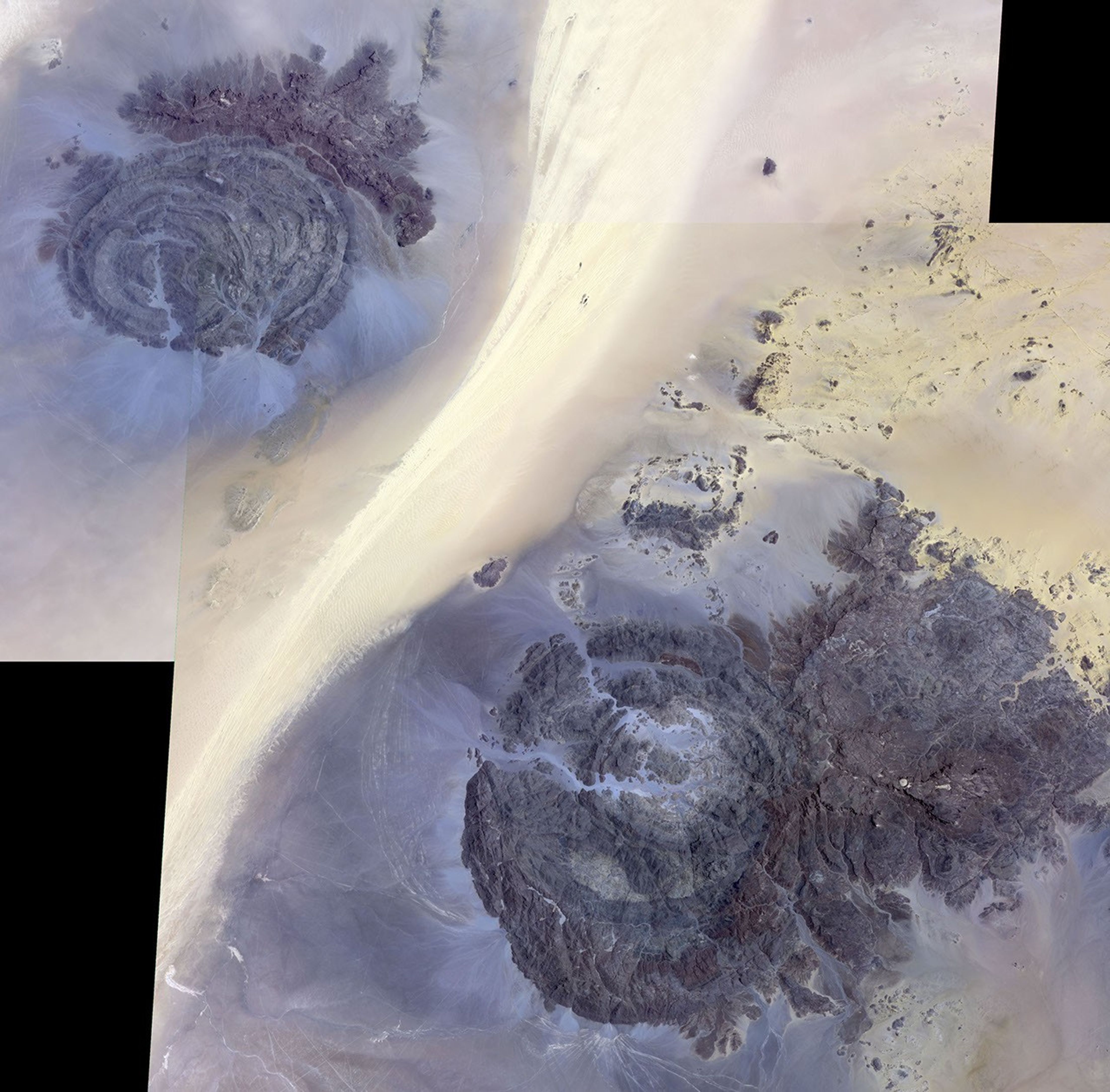In the far southeast corner of Libya, in the Libyan Desert, lie the uplifted massifs of Jebel Awenat and Jebel Arkenu. Both expose ancient Precambrian rocks. These images from NASA's Terra spacecraft were acquired July 19, 2012, and July 31, 2013.