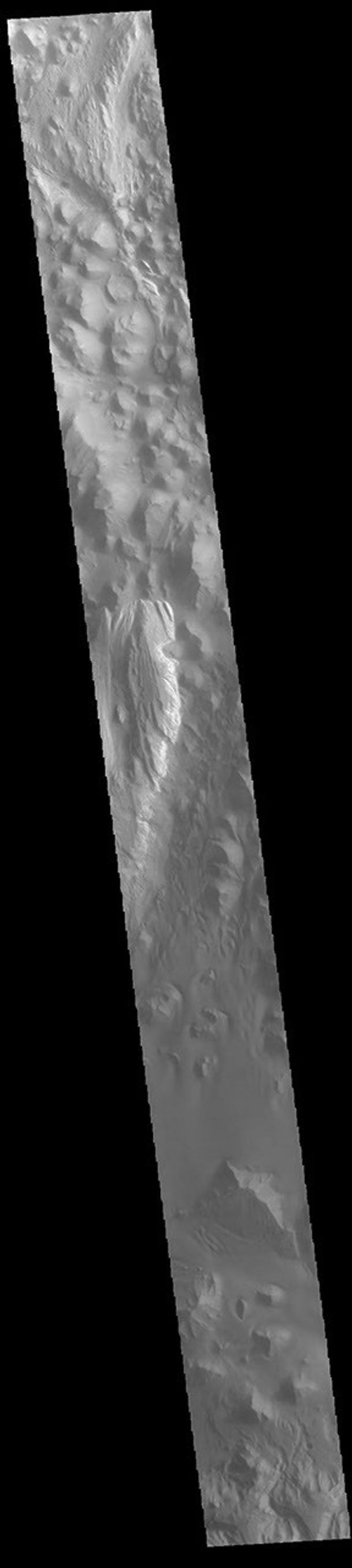 This image from NASA's 2001 Mars Odyssey spacecraft runs from northern Juventae Chasma to just short of the southern canyon wall.