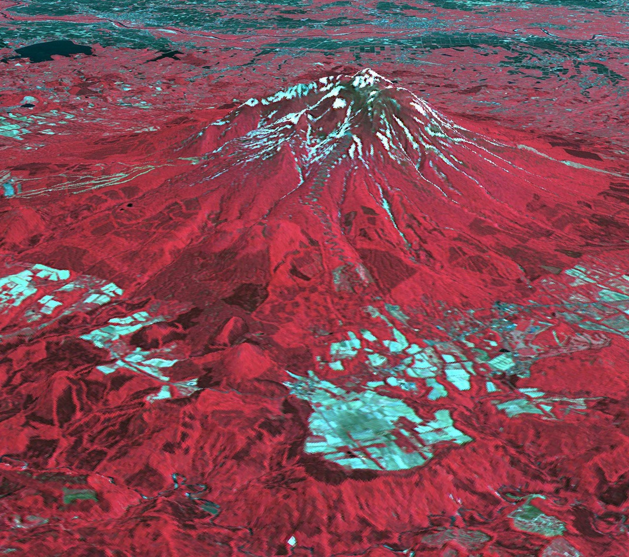 The Tsugaru Iwaki Skyline is a toll road in northern Japan, which partially ascends Mount Iwaki stratovolcano, and is notable for its steep gradient and 69 hairpin turns. This image from NASA's Terra spacecraft was acquired May 26, 2015.