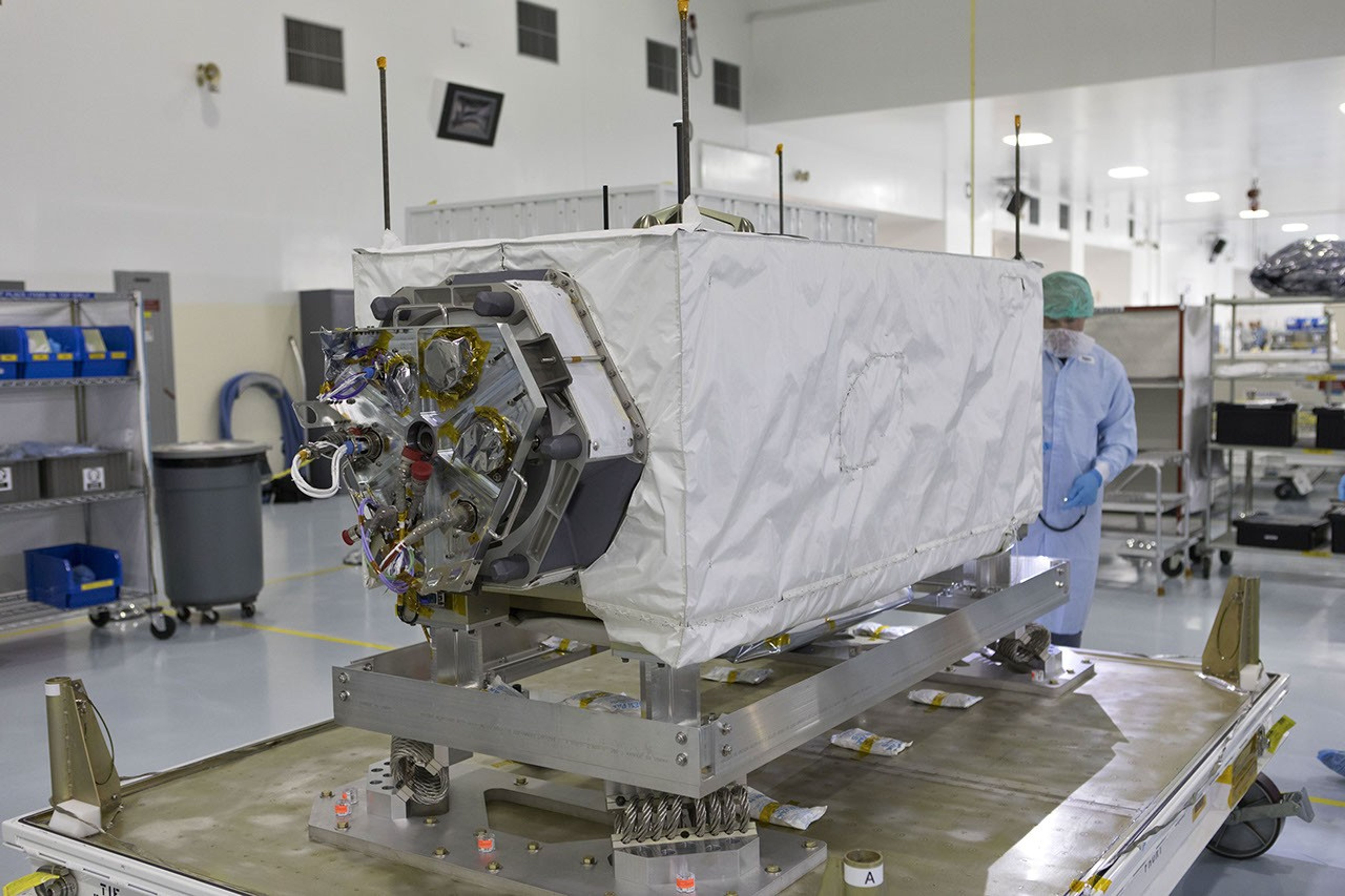 NASA's ECOsystem Spaceborne Thermal Radiometer Experiment on Space Station (ECOSTRESS) is inspected after arrival at Kennedy Space Center.