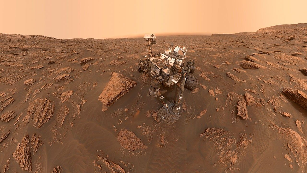 A self-portrait of NASA's Curiosity rover taken on Sol 2082 (June 15, 2018). A Martian dust storm has reduced sunlight and visibility at the rover's location in Gale Crater.