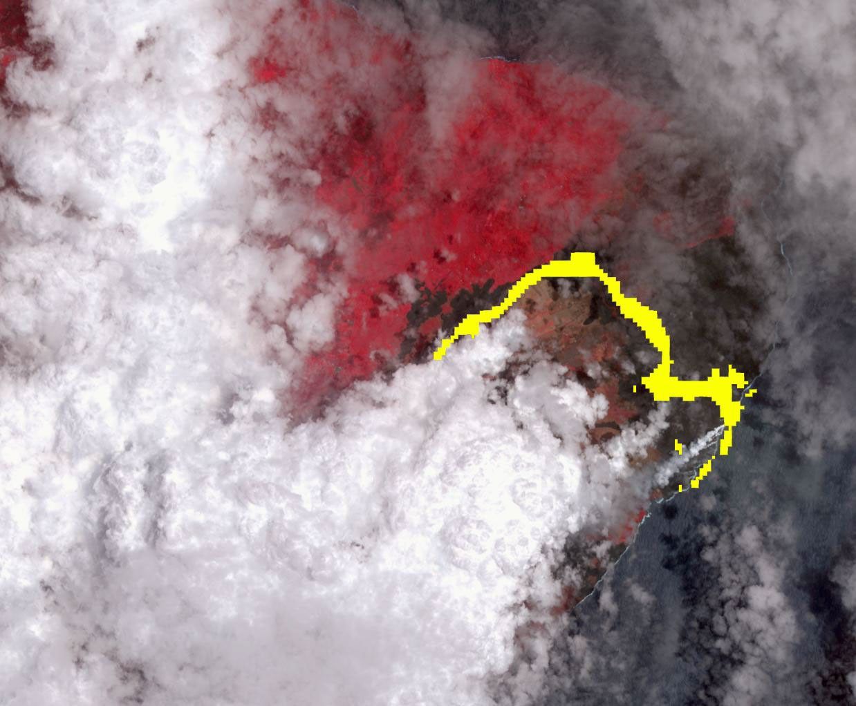 NASA's Terra spacecraft shows Hawaii's Kilauea volcano continues to create new land as flows from fissure 8, one of the most active to break ground since the eruption began in early May, reach the ocean.