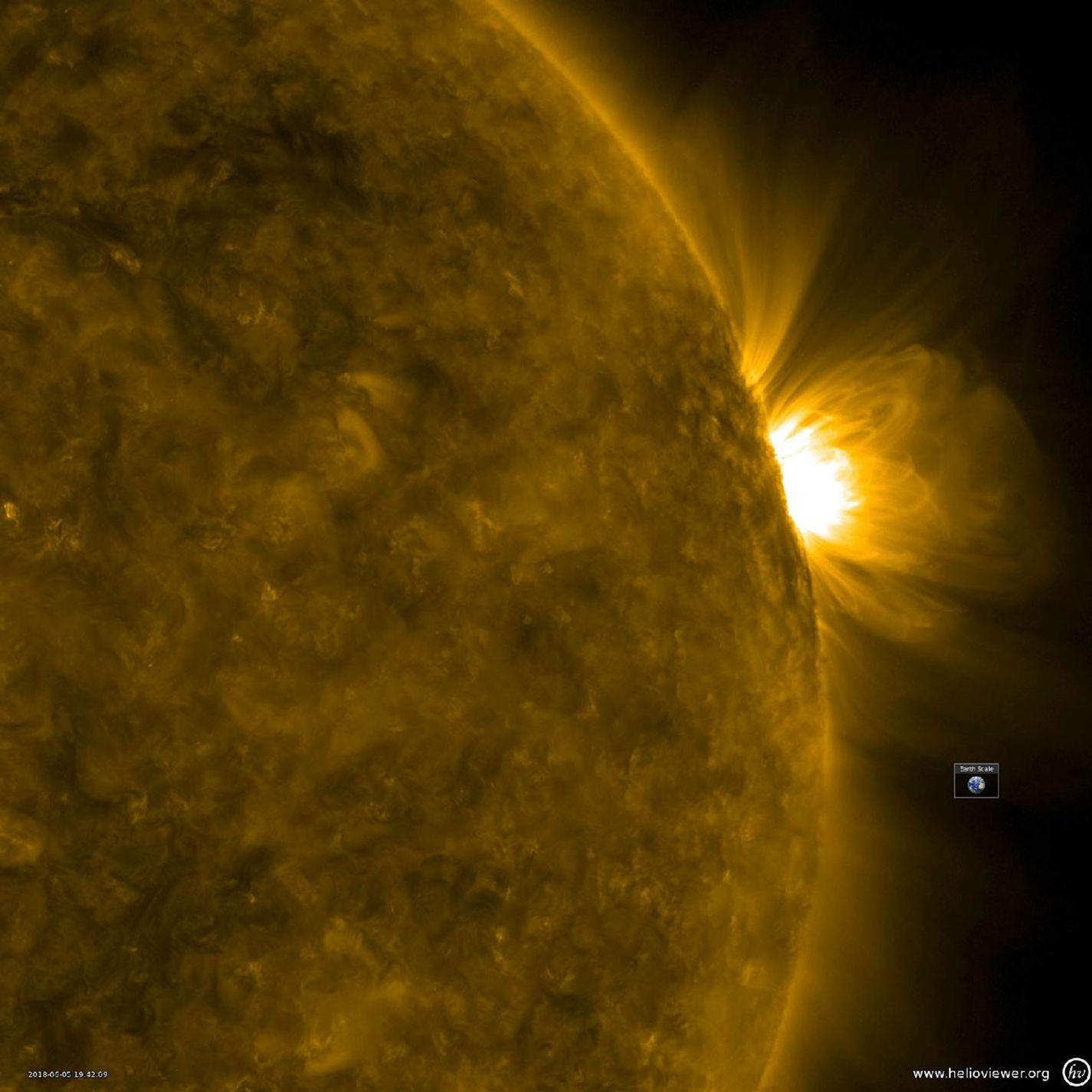 NASA's Solar Dynamics Observatory observed giant, bright coronal loops trace out the magnetic field lines above an active region from June 4-6, 2018.