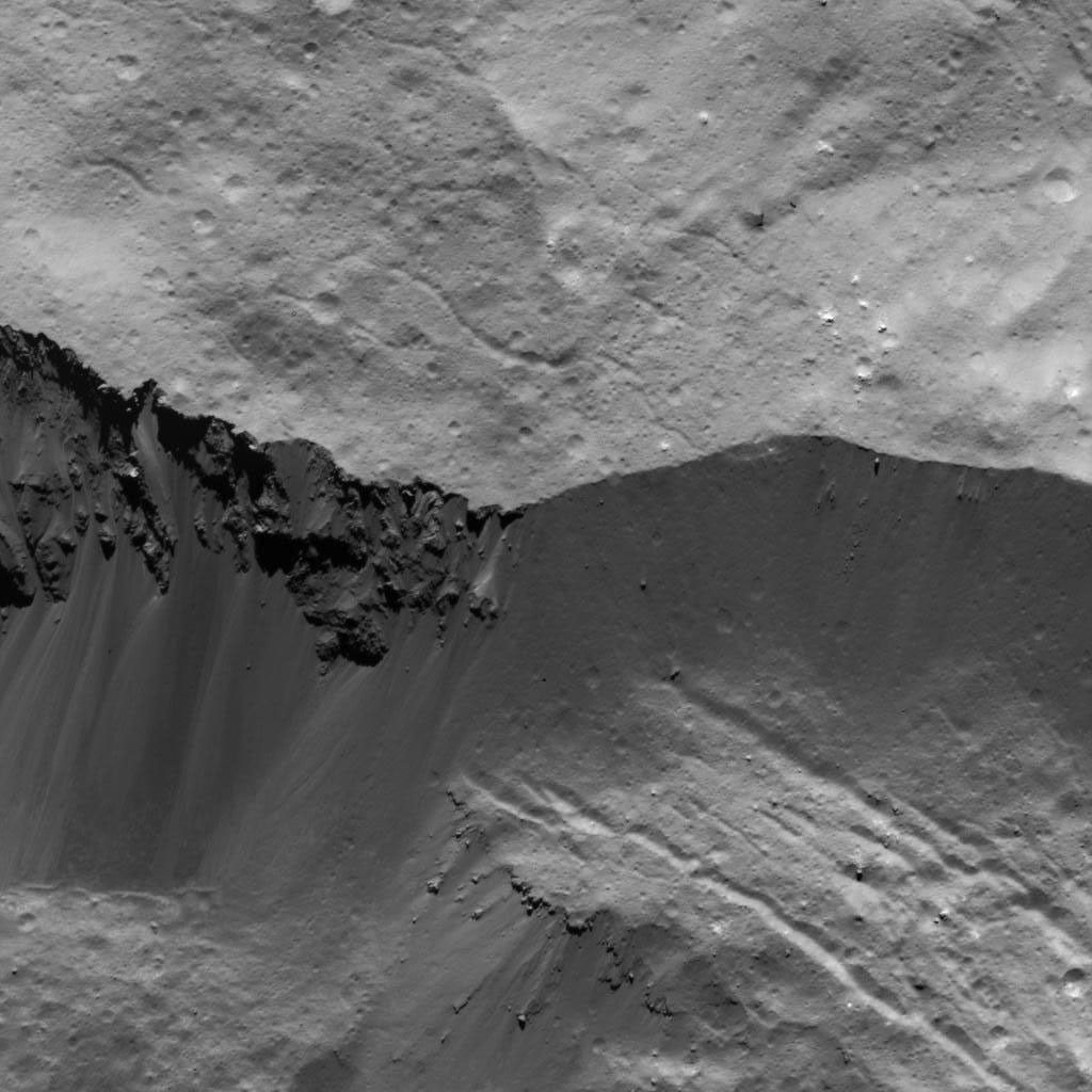 This image of a wall on Occator Crater on Ceres was obtained by NASA's Dawn spacecraft on July 5, 2018 from an altitude of about 26 miles (43 kilometers).