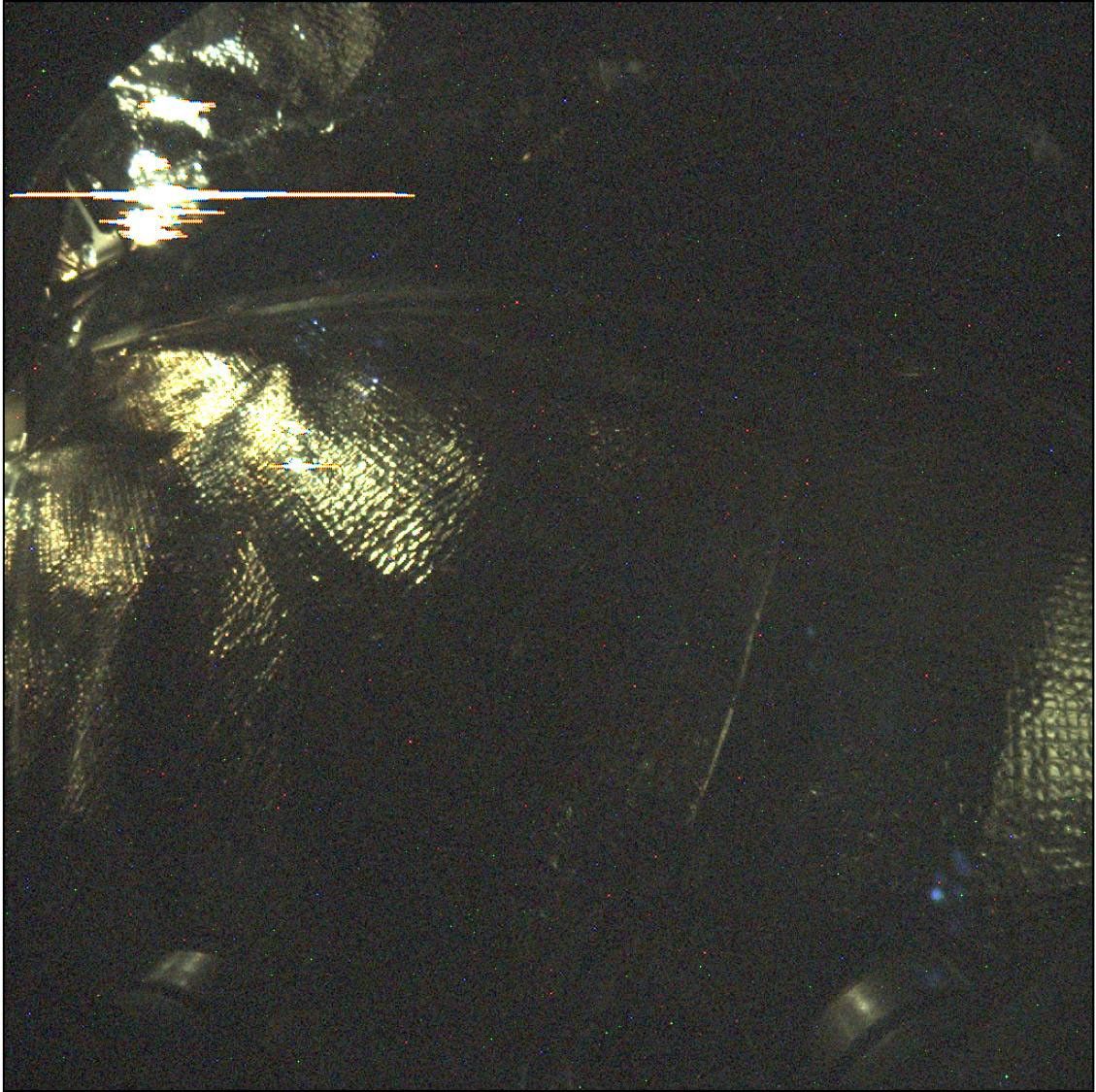 This long-exposure image (24 seconds) was taken by Instrument Context Camera (ICC) of NASA's InSight Mars lander. The image shows some of the interior features of the backshell that encapsulates the spacecraft.