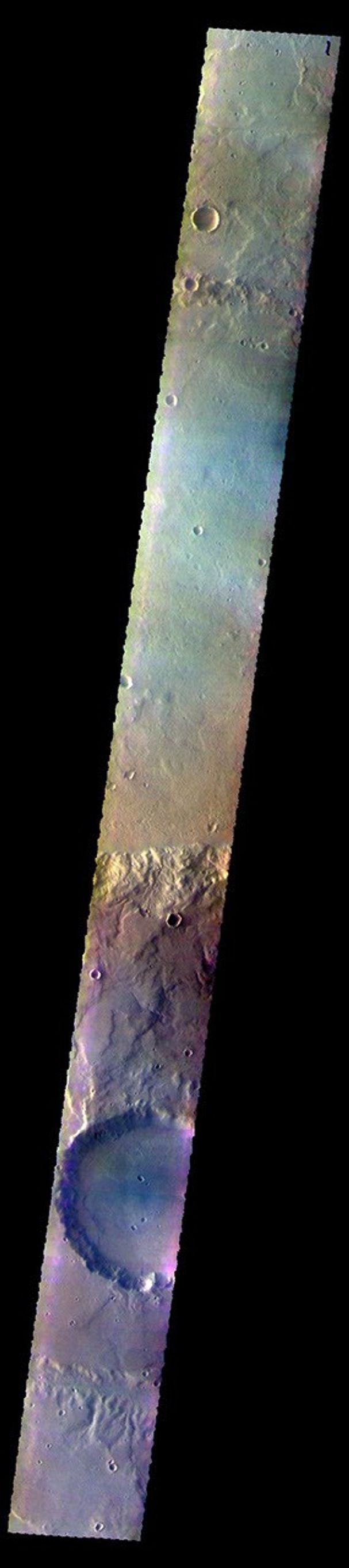 This image from NASA's Mars Odyssey shows several craters and plains of Terra Cimmeria.