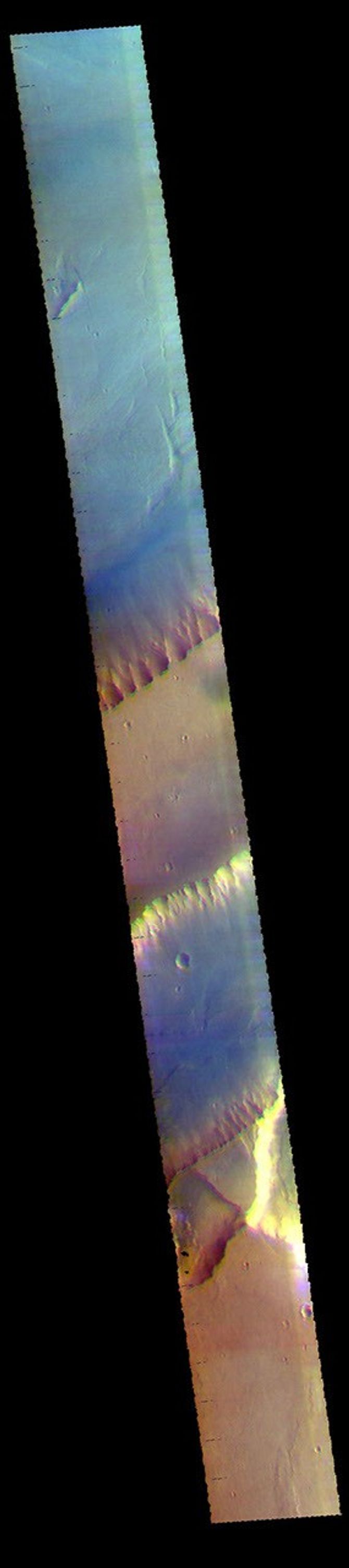 This image from NASA's Mars Odyssey shows a portion of Kasei Valles. The plateau in the center of the image is called Lunae Mensa.