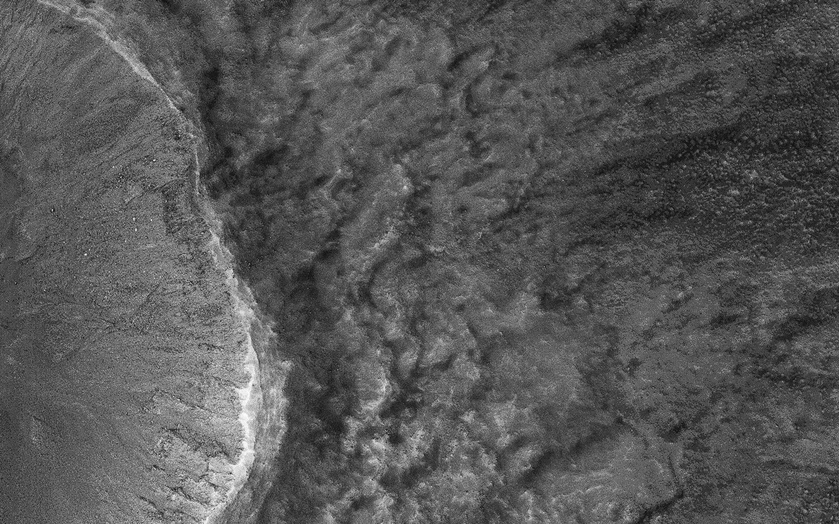 This image acquired on July 22, 2018 by NASA's Mars Reconnaissance Orbiter, shows that the sensitivity of HiRISE enabled imaging of surface features through a moderate level of haze.