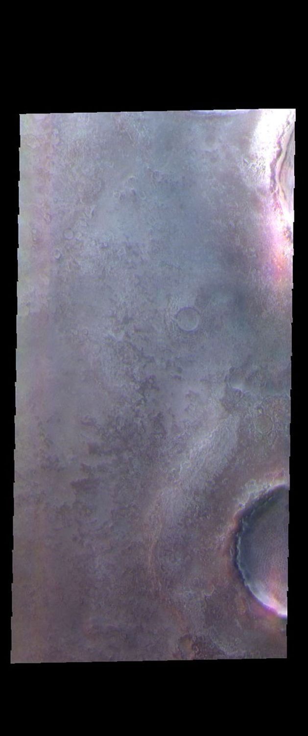 This image from NASA's Mars Odyssey shows the margin and ejecta surrounding two craters located in the northern plains.