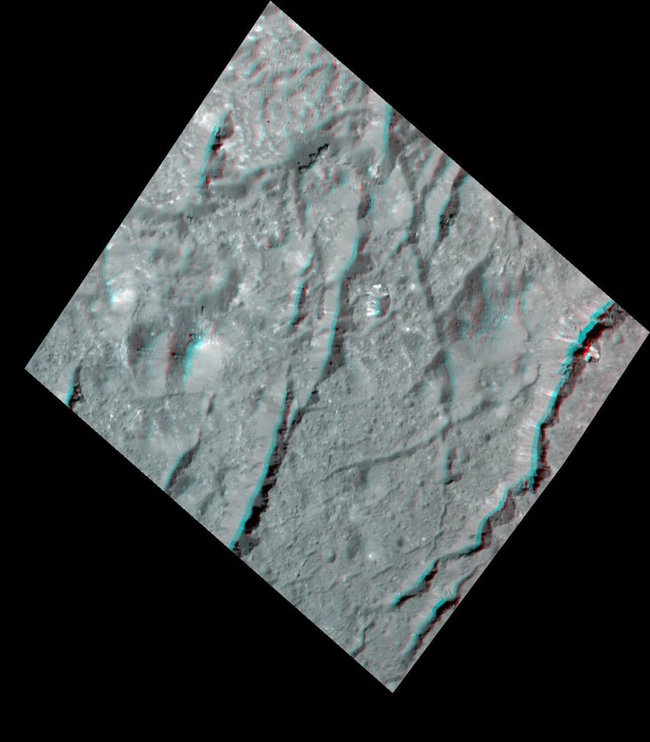 This stereo view, called an anaglyph, of cracks in the floor of Occator Crater on Ceres was obtained by NASA's Dawn spacecraft from an altitude of about 22 miles (35 kilometers).