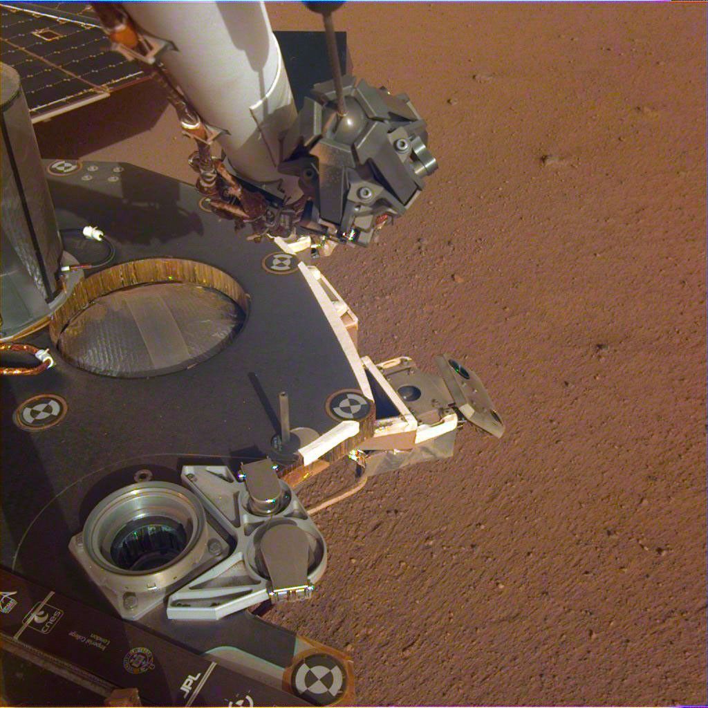 This image shows a partial view of the deck of NASA's InSight lander, where it stands on the Martian plains Elysium Planitia.