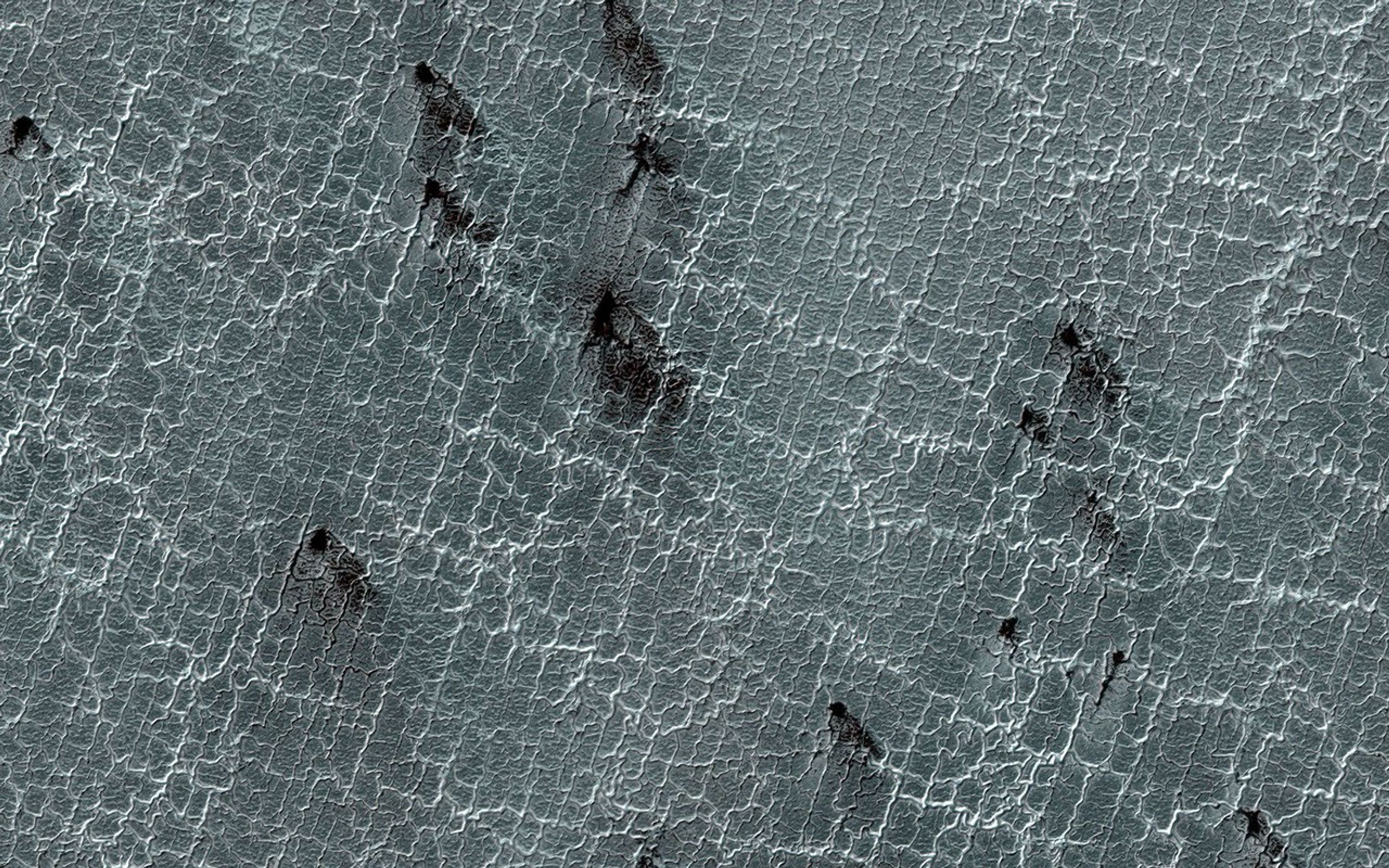 This image acquired on September 18, 2018 by NASA's Mars Reconnaissance Orbiter, shows araneiform terrain (colloquially: spider-like terrain) located in the south polar region of Mars.