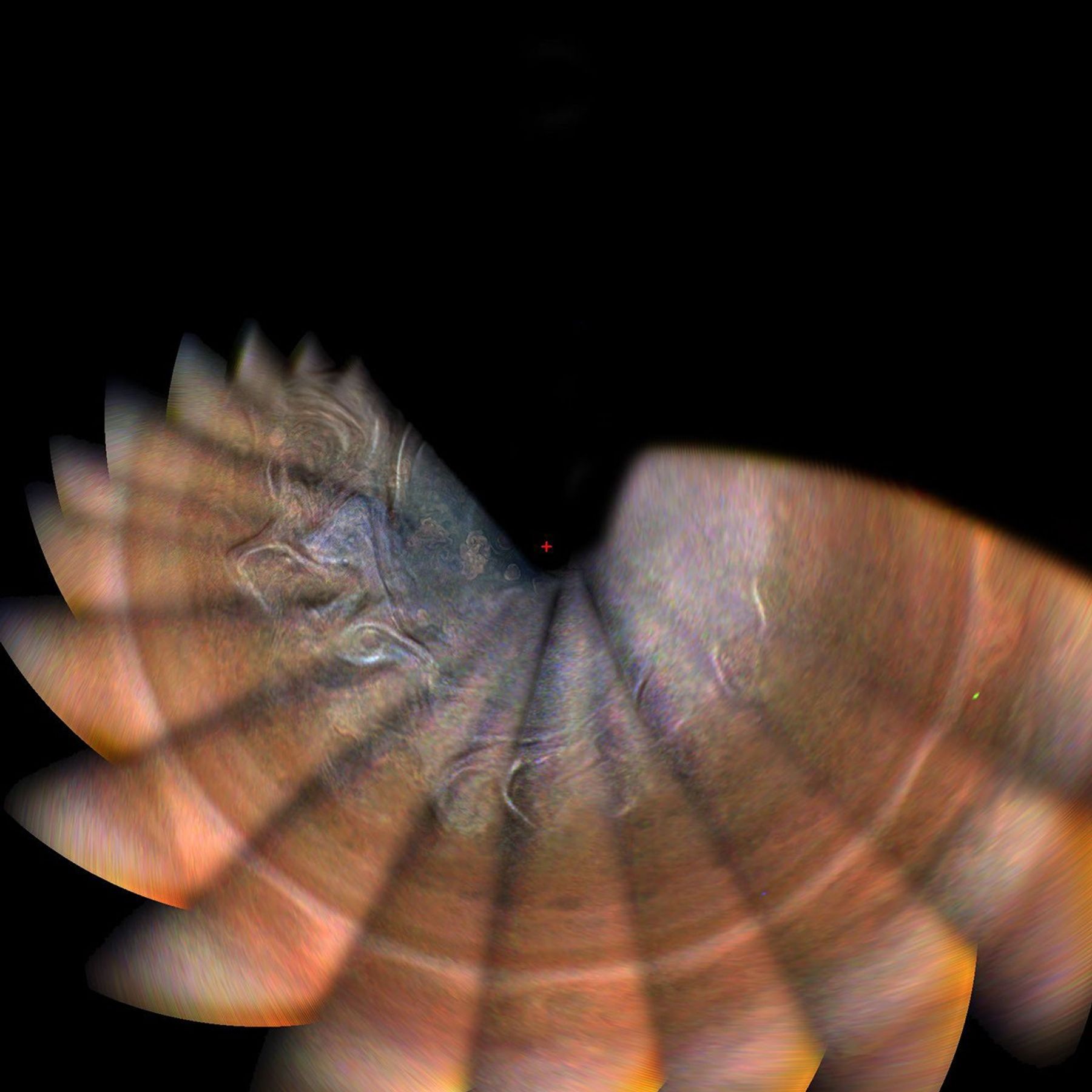 This mosaic combines color-enhanced images from NASA's Juno spacecraft, taken over Jupiter's north pole when the lighting was excellent for detecting high bands of haze.