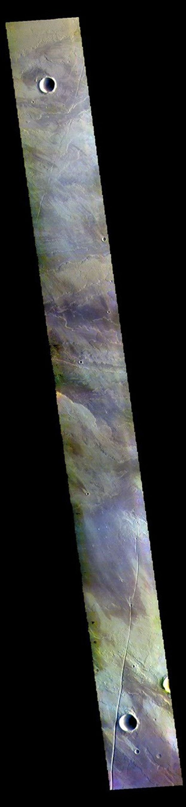 This image from NASA's Mars Odyssey shows a small part of the extensive volcanic plains located east of Olympus Mons.
