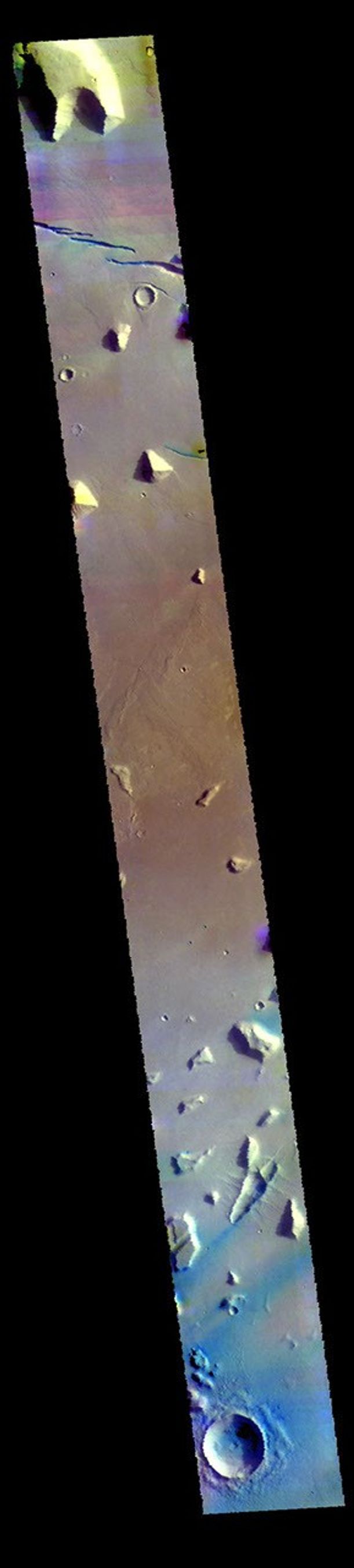 This image from NASA's Mars Odyssey shows Elysium Planitia. The linear depressions at the top of the image are created by tectonic faults.