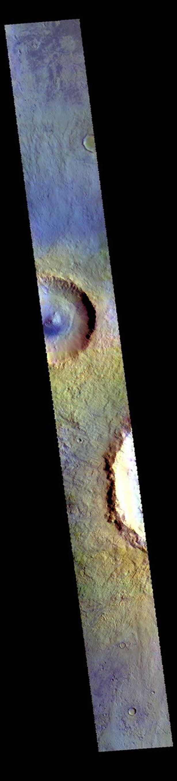 This image from NASA's Mars Odyssey shows central Acidalia Planitia. The crater just off the edge at the bottom part of the image is Bonestell Crater.