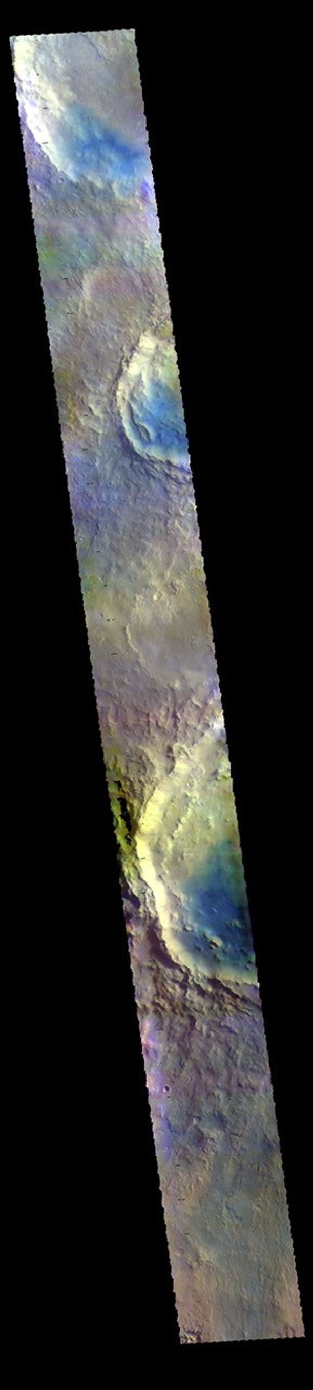 This image from NASA's Mars Odyssey shows parts of several craters located in Arabia Terra. Blue tones in false color images indicated the presence of basaltic sands.