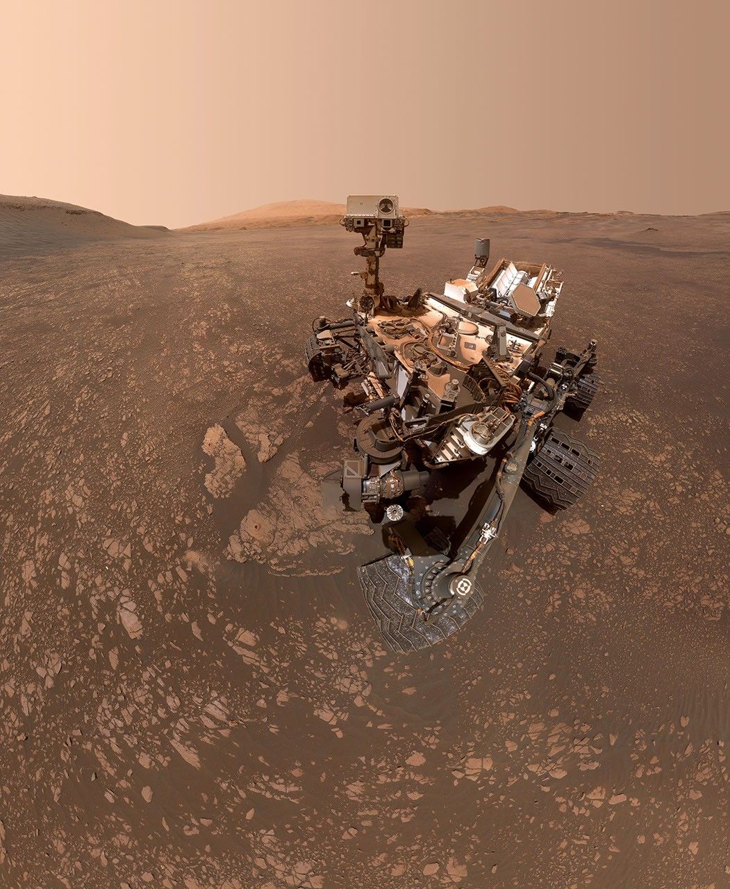 NASA's Curiosity Mars rover took this selfie on May 12, 2019 (the 2,405th Martian day, or sol, of the mission). To the lower-left of the rover are its two recent drill holes, at targets called Aberlady and Kilmarie.