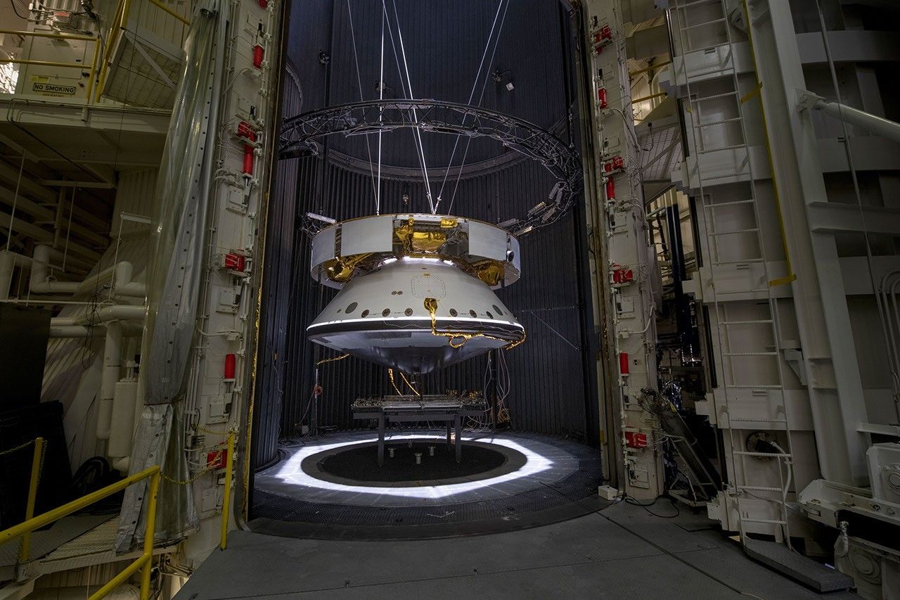 The completed spacecraft that will carry the Mars 2020 rover to the Red Planet, next year hangs suspended by cables inside the Space Simulator Facility at NASA's Jet Propulsion Laboratory in Pasadena, California. The image was taken on May 9, 2019.