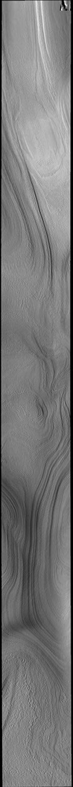 This image from NASA's Mars Odyssey shows part of the south polar cap. The numerous layers that comprise the polar cap are readily visible.